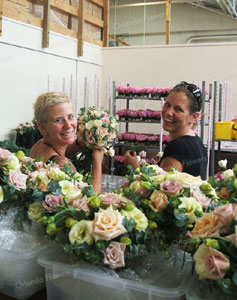 Carla and Teresa creating wedding flowers