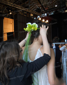 Sophie fitting a models head gear - NZ Weddings - Fashion Week 