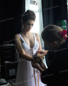 Susan fitting a wristlet - NZ Wedding - Fashion Week
